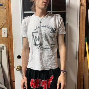 Y2K English Laundry white tee with shoulder tassle